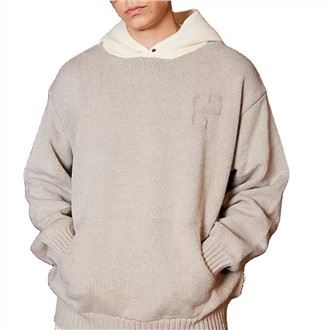 Quelle est la résistance à l'abrasion d'un pull en coton peigné ?